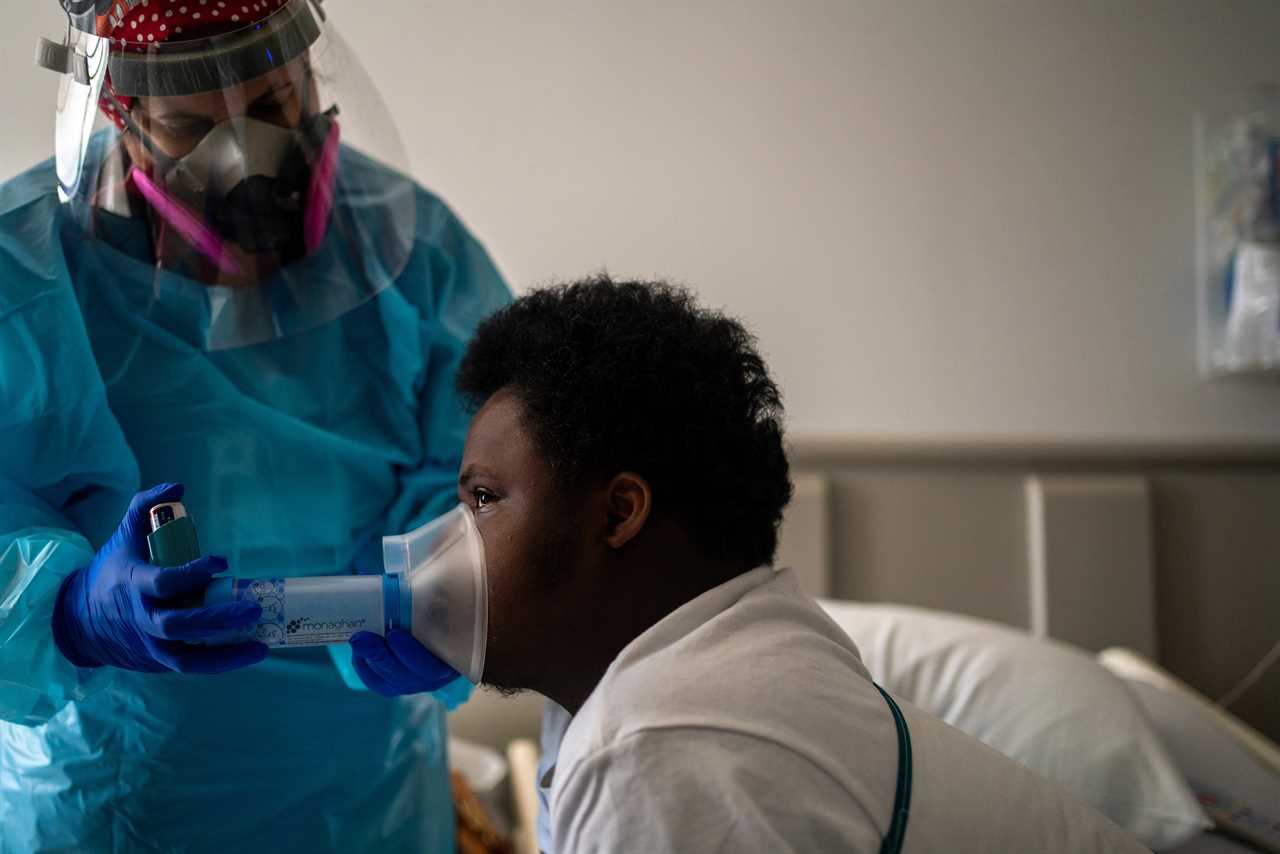 Nelson Alexis III, 17, undergoes respiratory therapy in his room at Children&acirc;s Hospital New Orleans. Nelson, who has Down syndrome, was diagnosed with the virus in late July.