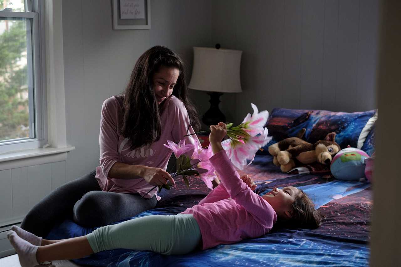 Mia shares a moment with her mother, Diana. Waldick, New Jersey, 2021 &Acirc;&copy; Sean Sirota for Time Magazine
