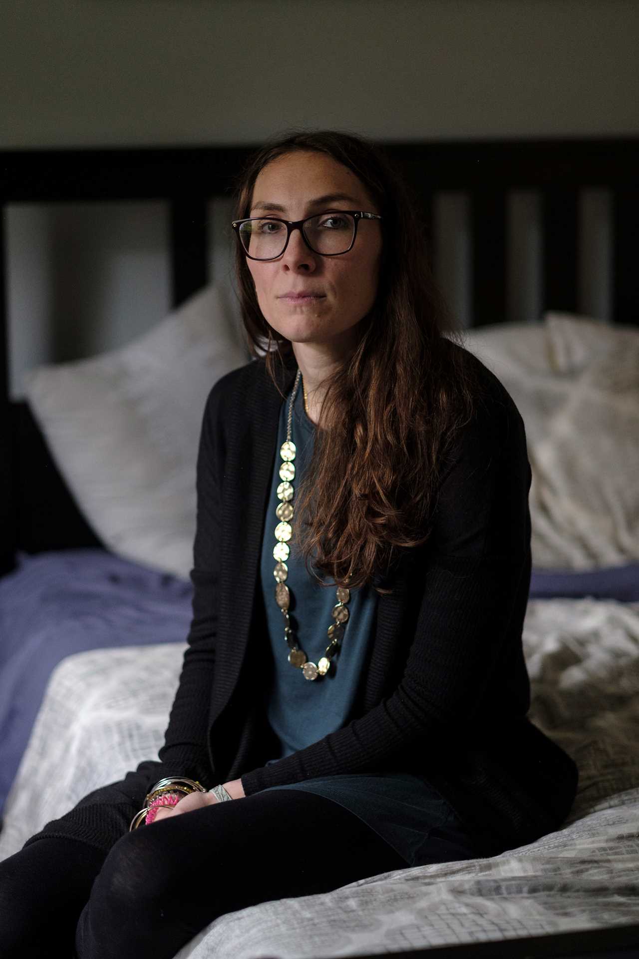 Pamela Addison poses for a portrait in her bedroom. Pamela lost her husband, Martin Addison, to COVID-19. Waldick, New Jersey, 2021 &Acirc;&copy; Sean Sirota for Time Magazine
