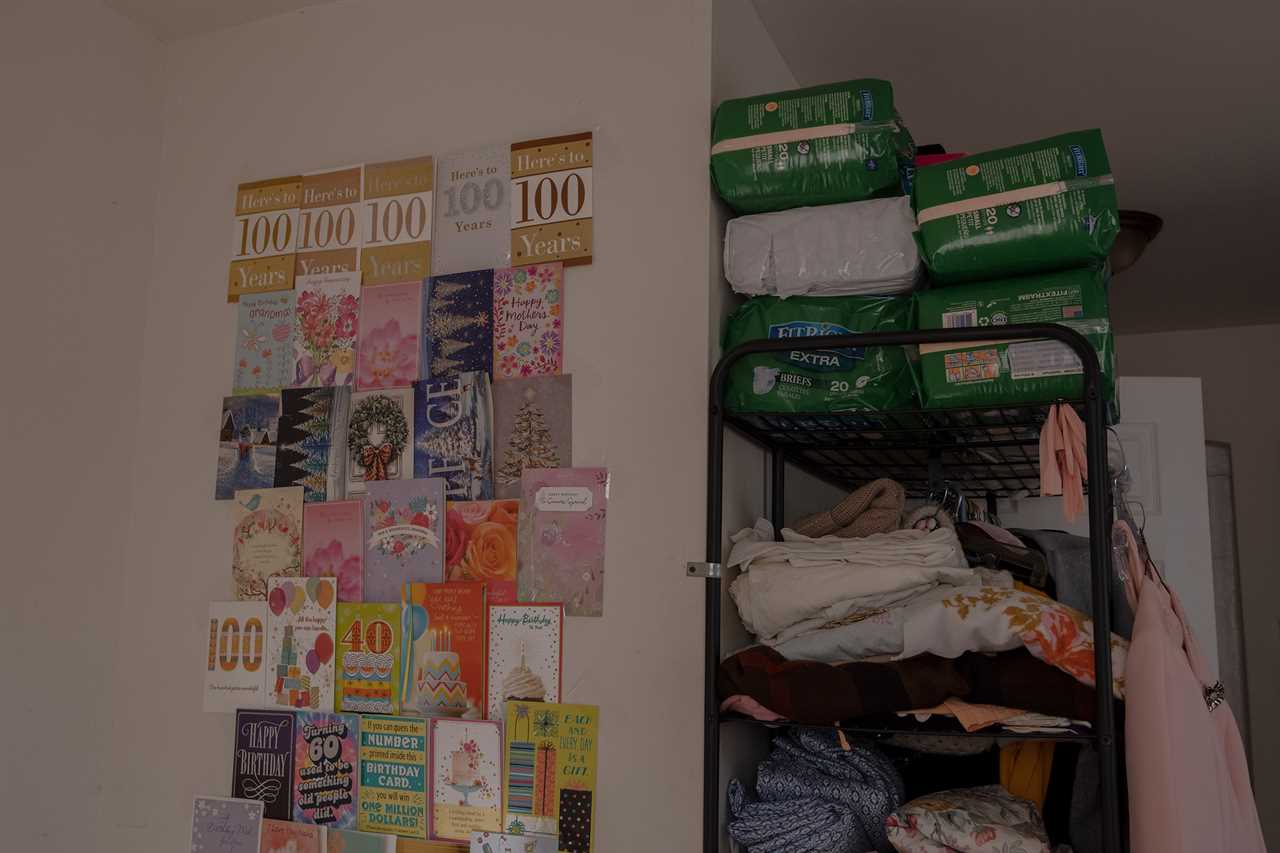 Birthday cards marking Stackhouseâs 100th birthday, and other holiday cards, are hung on her bedroom wall.