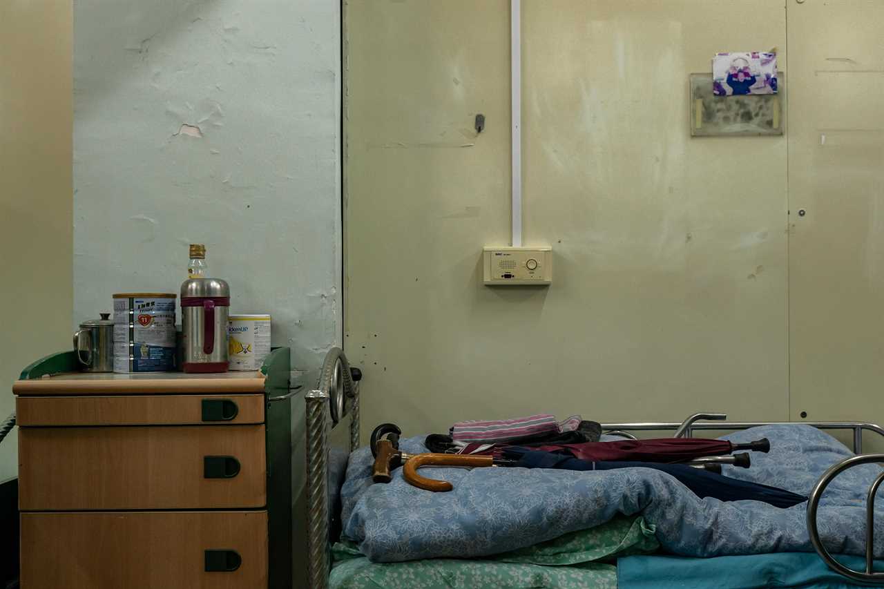 Belongings of a deceased resident are seen at a living cubicle of Kei Tak (Tai Hang) Home For The Aged.