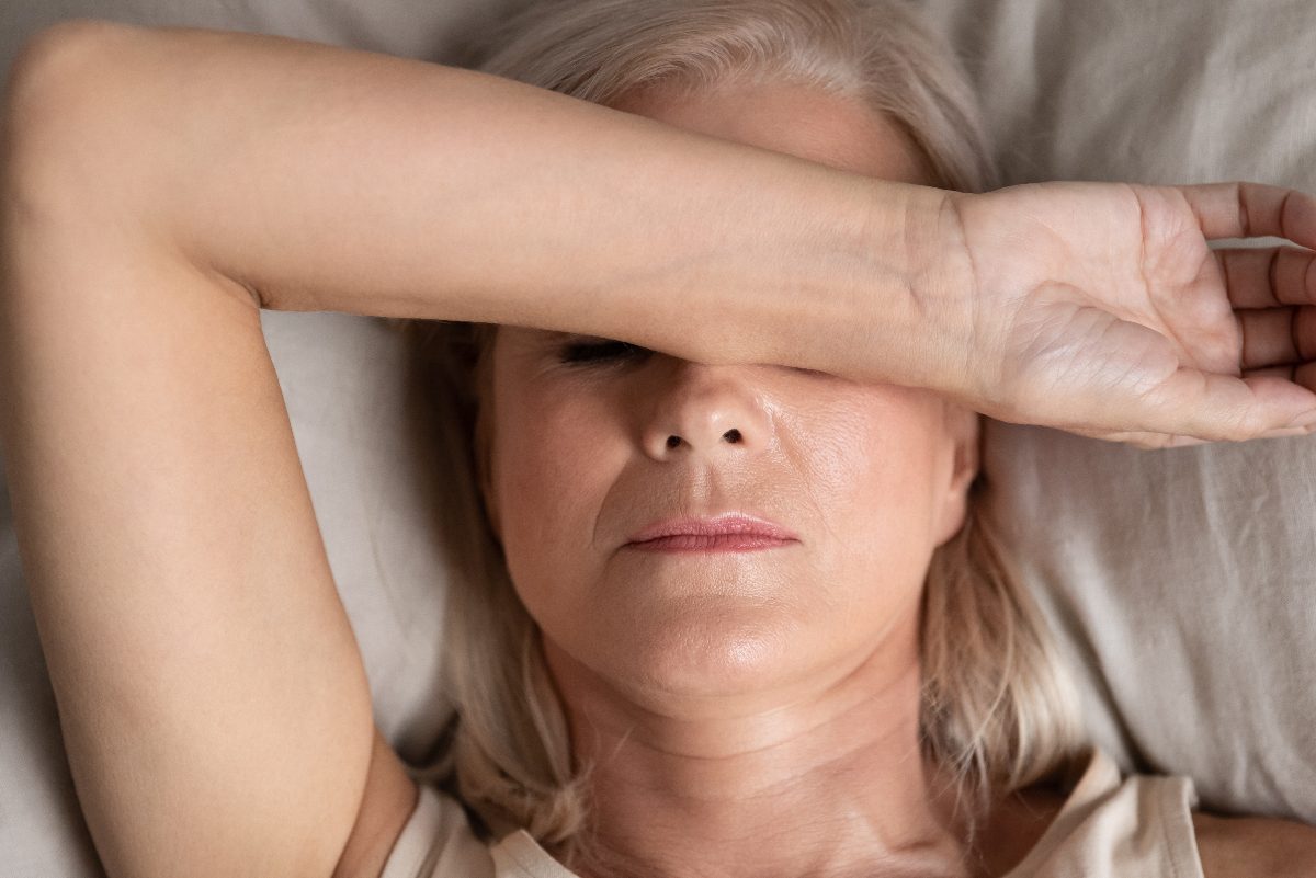 woman trouble sleeping while dealing with menopause