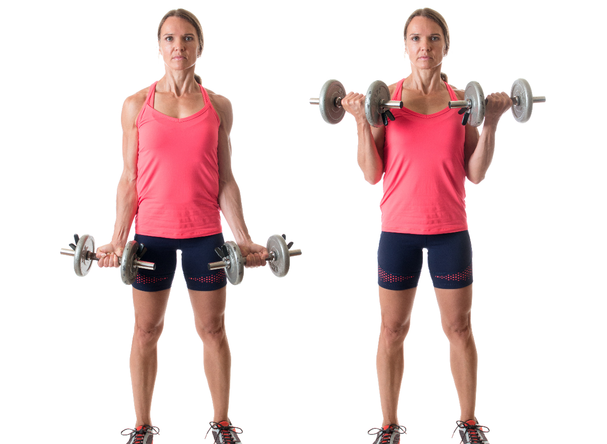 woman performing dumbbell bicep curls