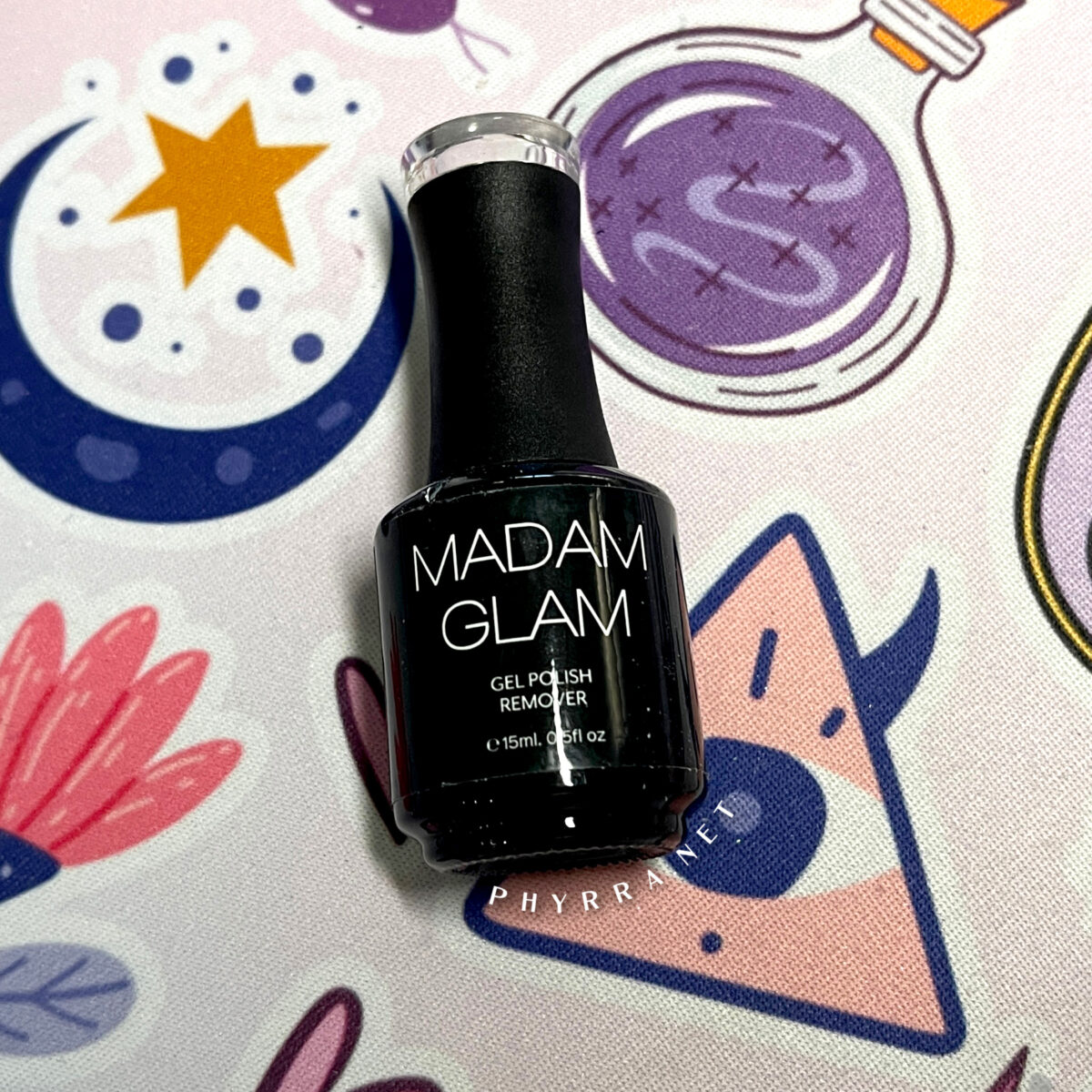 a bottle of Madam Glam Gel Polish Remover