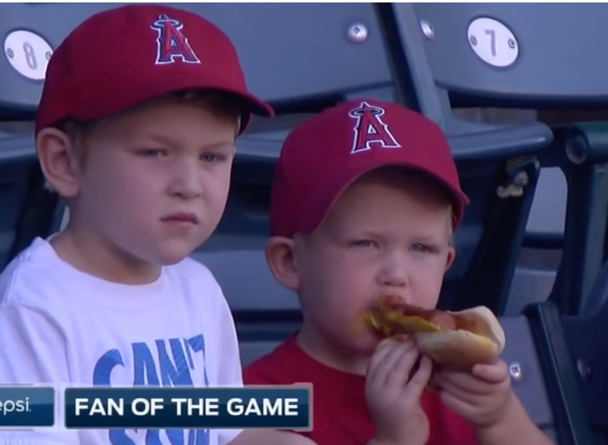 kid eating hot dog