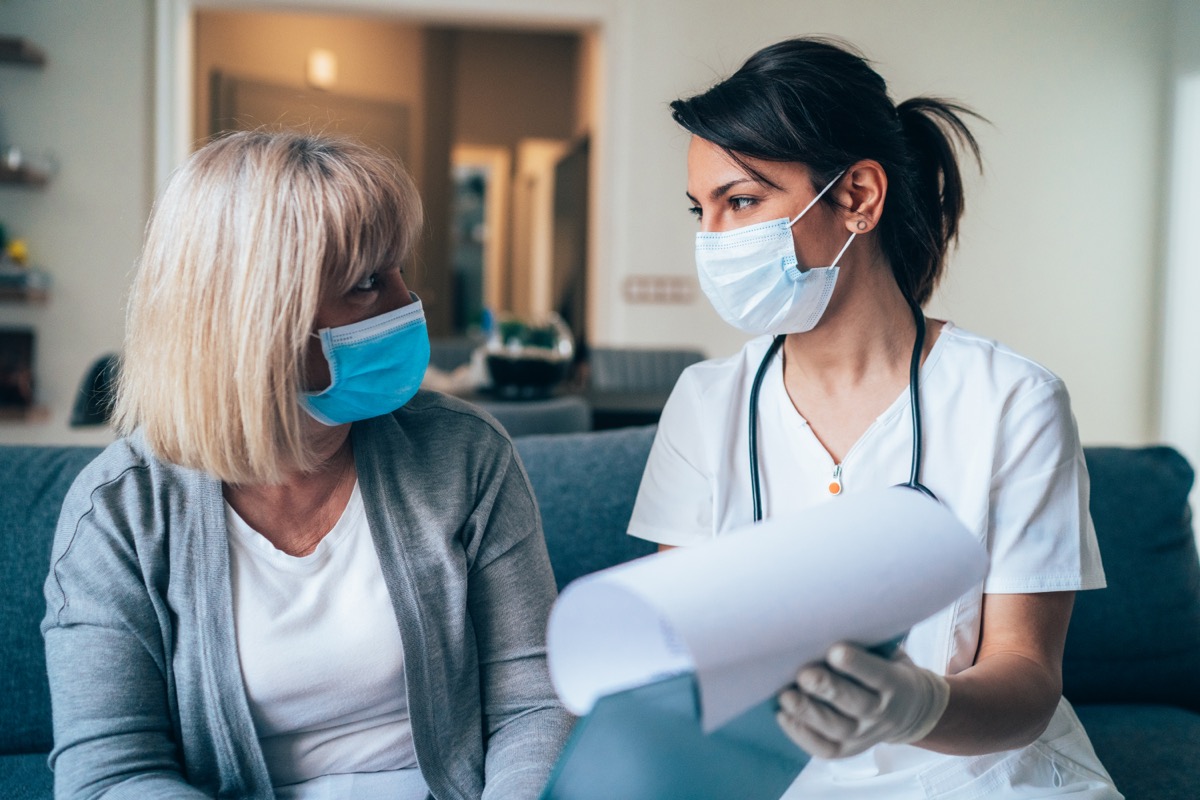 Female doctor consults mature patient during the quarantine for coronavirus.