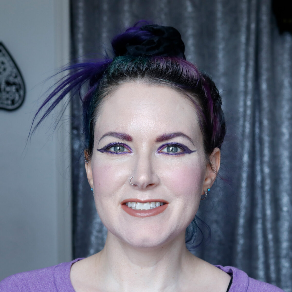 Cordelia is wearing Salt New York Sneaky Balm in N13