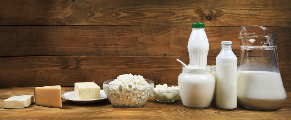 Set from dairy products on wooden table