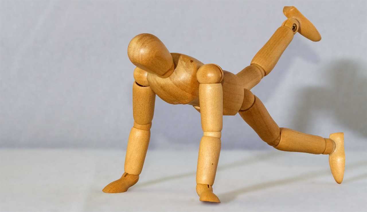 A figure doing a push-up