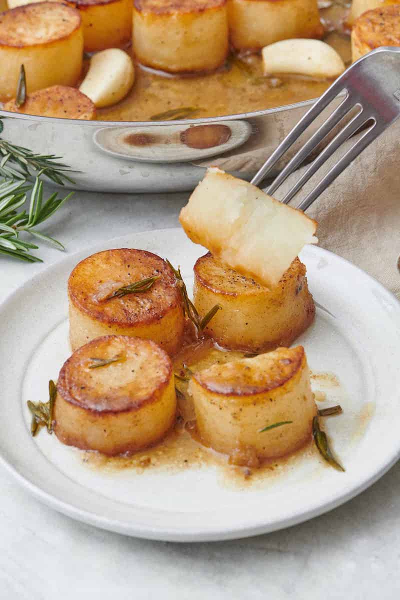 fondant melting potatoes on a fork