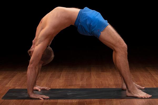 Man Holds Wheel Pose | Backbends